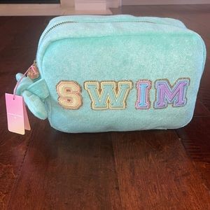 Large zippered pouch with strap